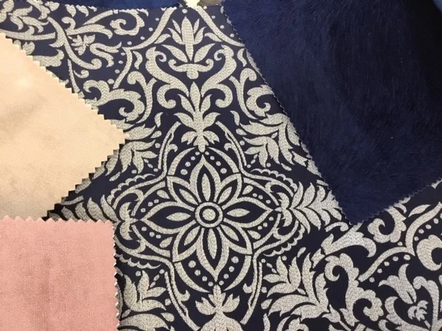 Luxe mood boards using a rich navy brocade fabric with gold, navy and blush pink velvets.