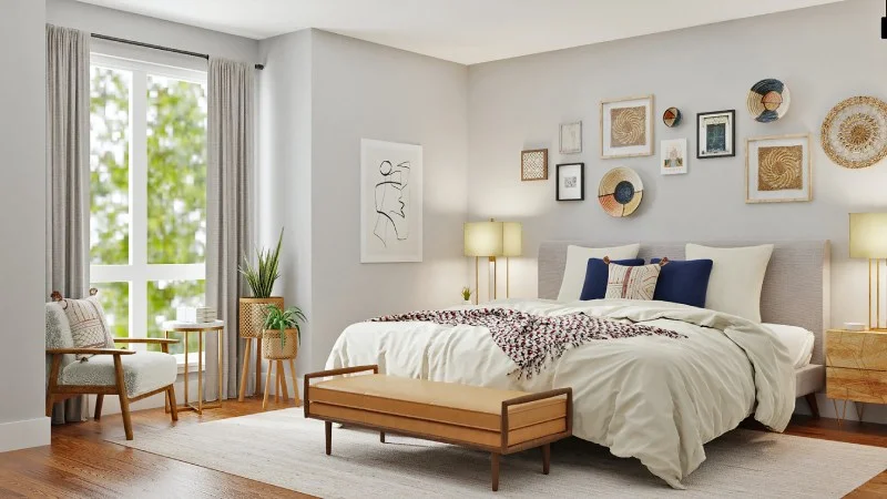 Bedroom curtains with bed, headboard, scatter cushions, bedside tables, bedside lamp and armchair