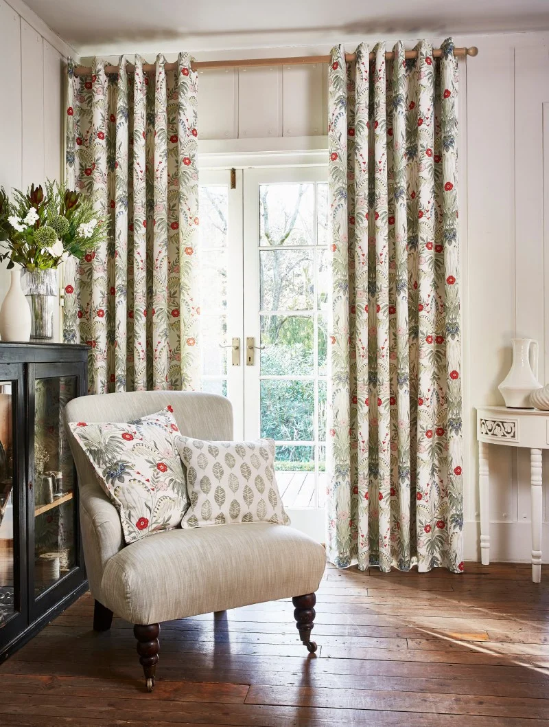 Eyelet curtain with comfy arm chair