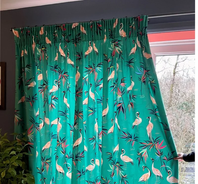pencil Pleat curtain made in Green heron velvet fabric