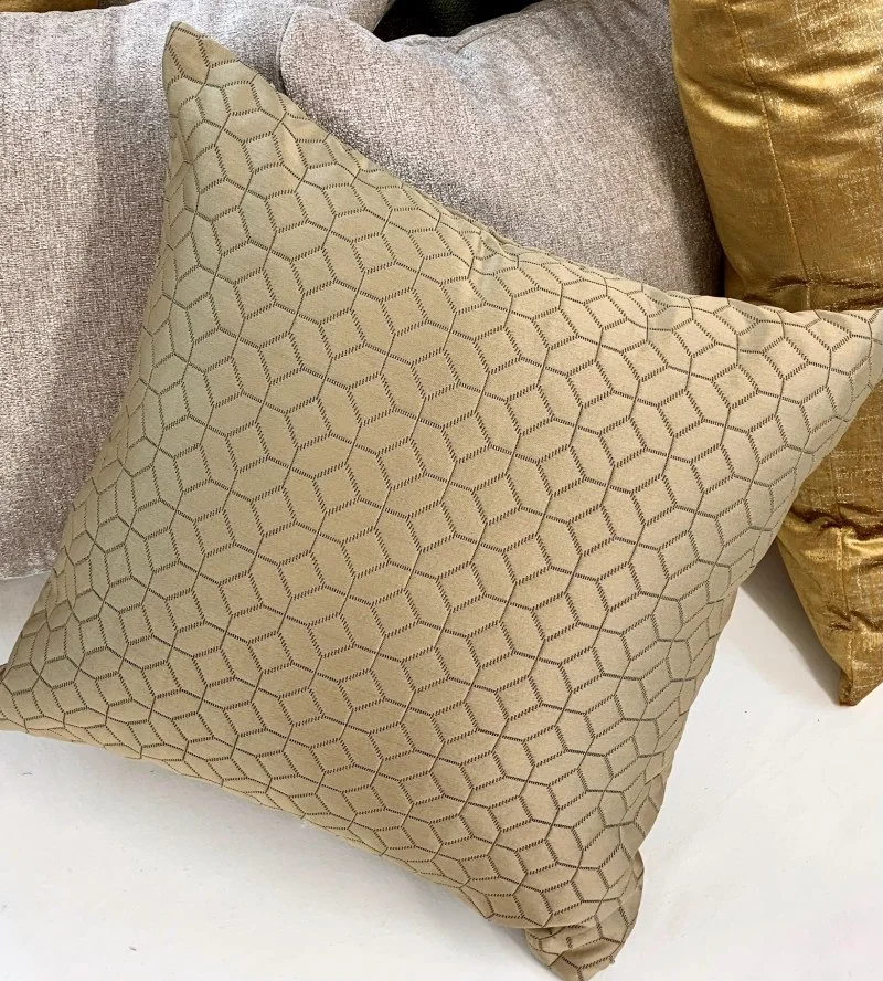 Gold coloured scatter cushions