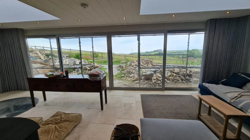 Recessed curtain track with bifold doors