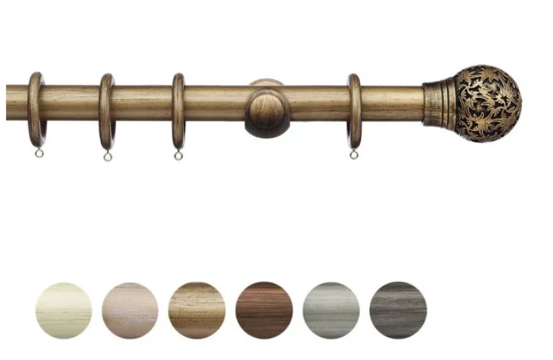 Gold wooden curtain pole with engraved finial